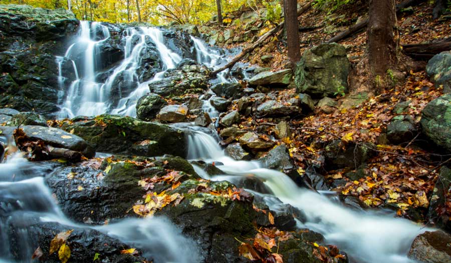 View of a rocky Ramapo Falls during fall season in New Jersey