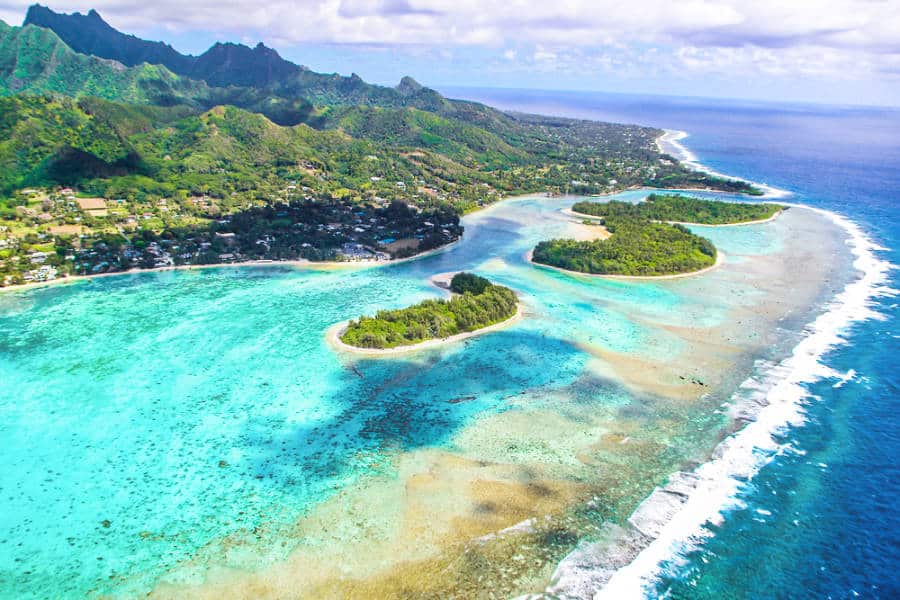 Aerial view of the Rarotonga island and the turquoise blue ocean water