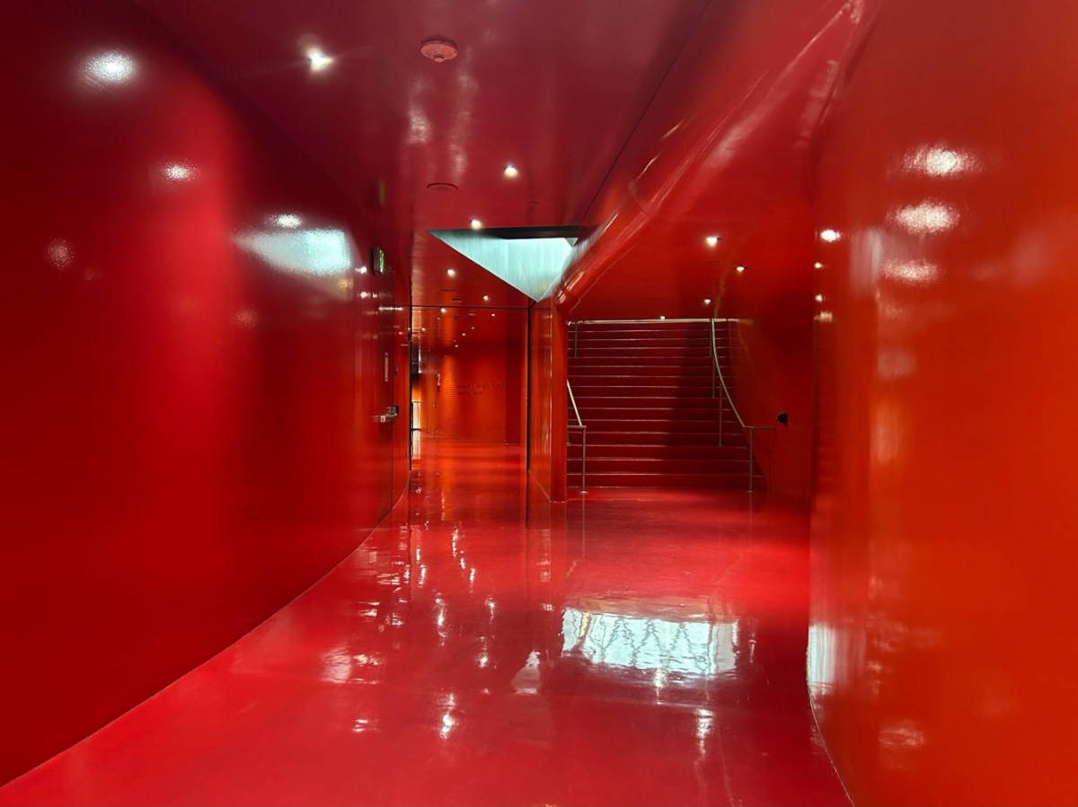 The bold red interior and floor in Seattle Central Library