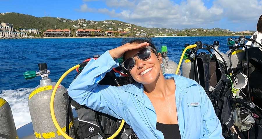 The author's wife posing for a photo during their scuba diving with Red Hook Dive Center
