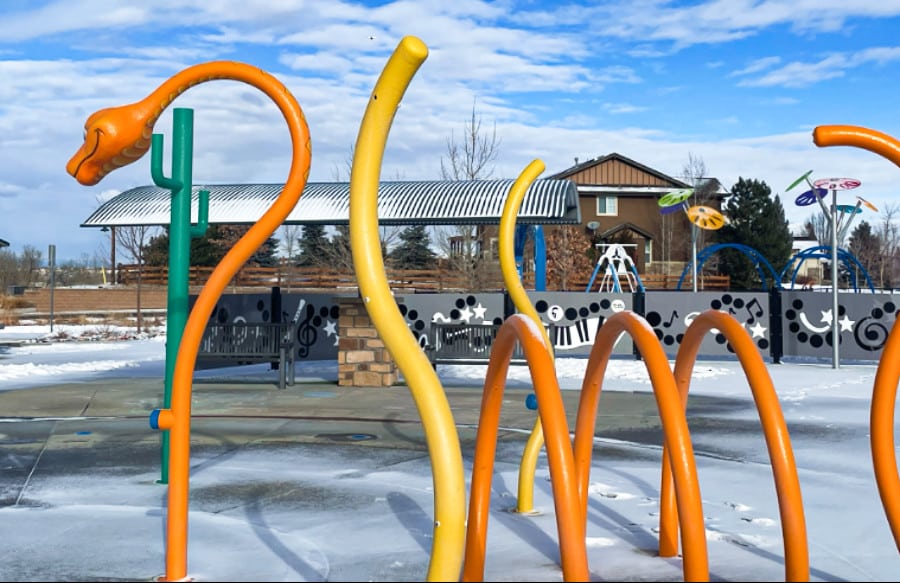 A colorful and whimsical kids’ playground in Red-tailed Hawk Park