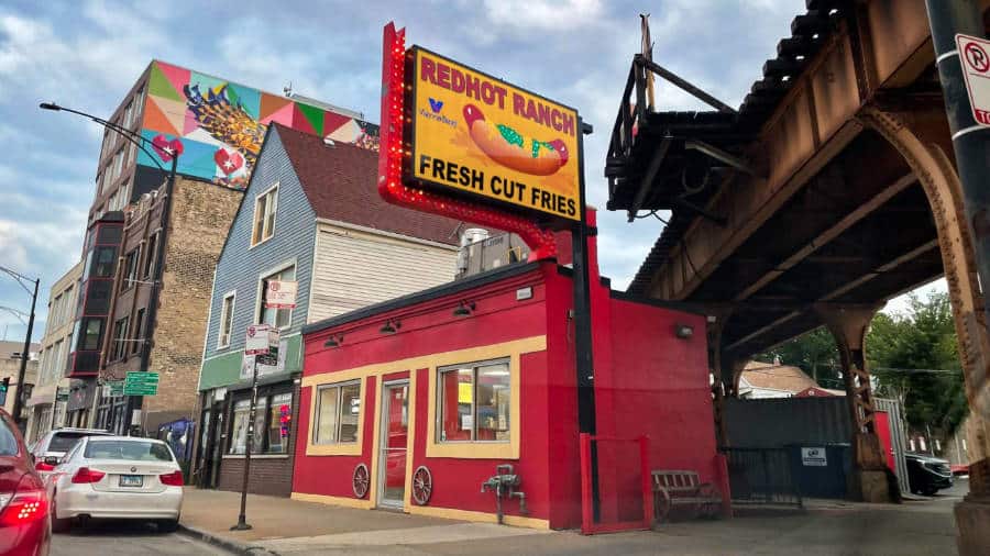 Exterior view of the Redhot Ranch with neon sign above from the Bucktown location