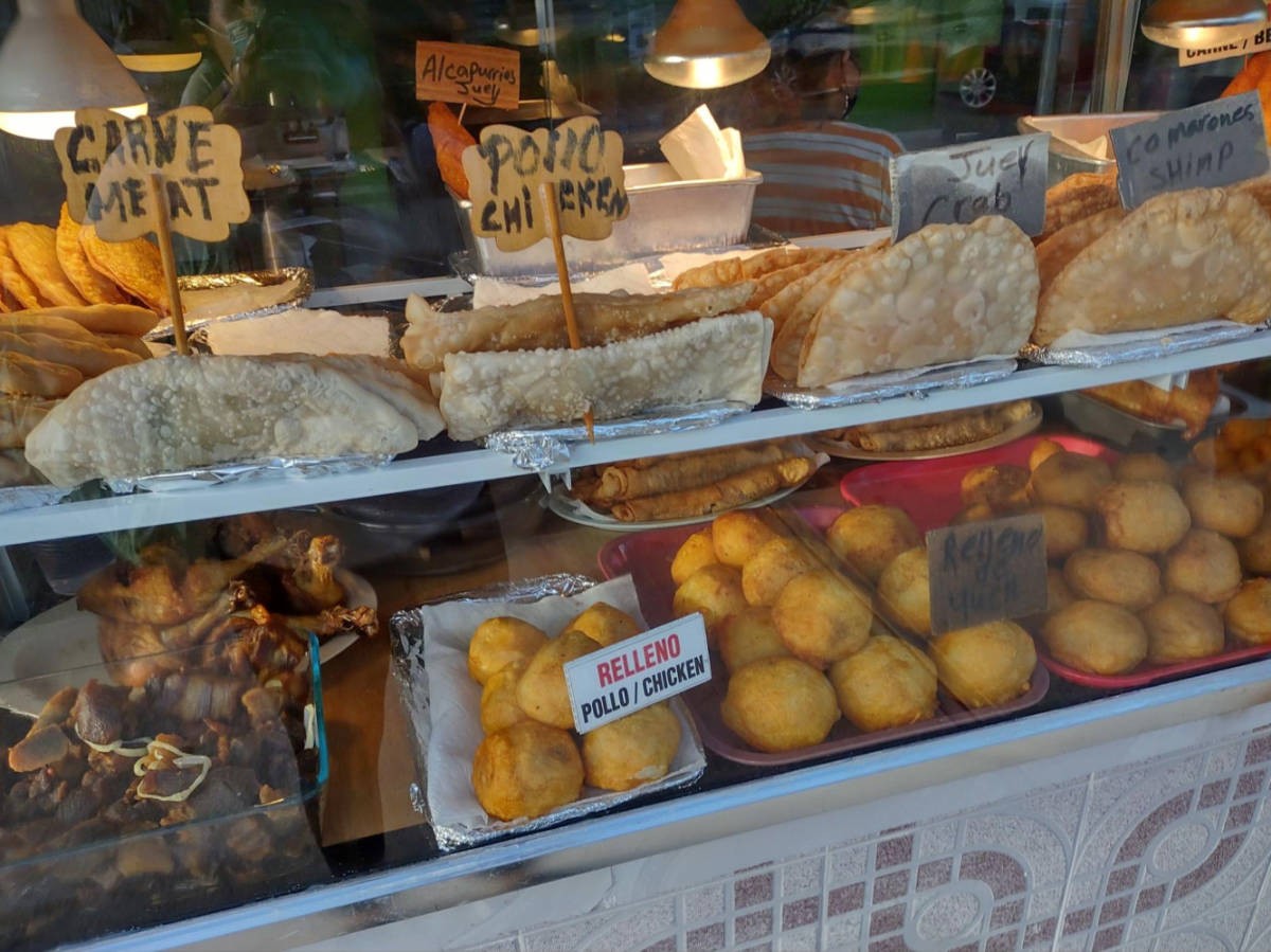 A display of the variety of local food and Rellenos de Papa
