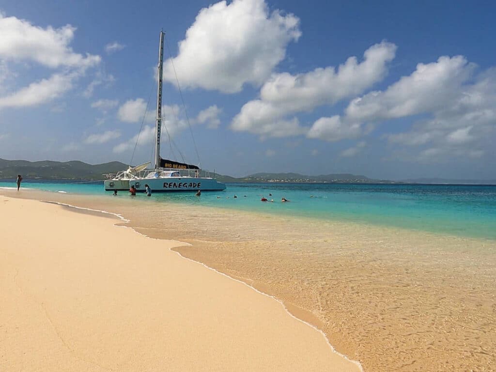The Renegade sail and tourists enjoying their day at the Buck Island Reef National Monument