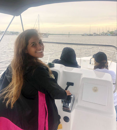 The author's wife driving a boat in Fort Lauderdale