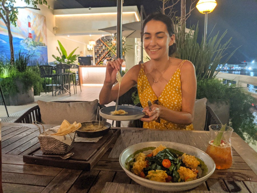 Clara trying out some food in Restaurante del Museo