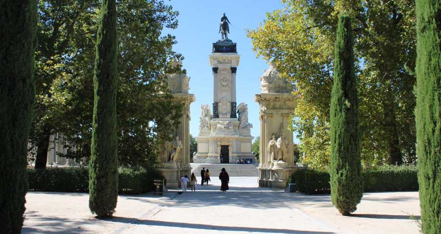 The Retiro Park under the clear blue sky in Madrid