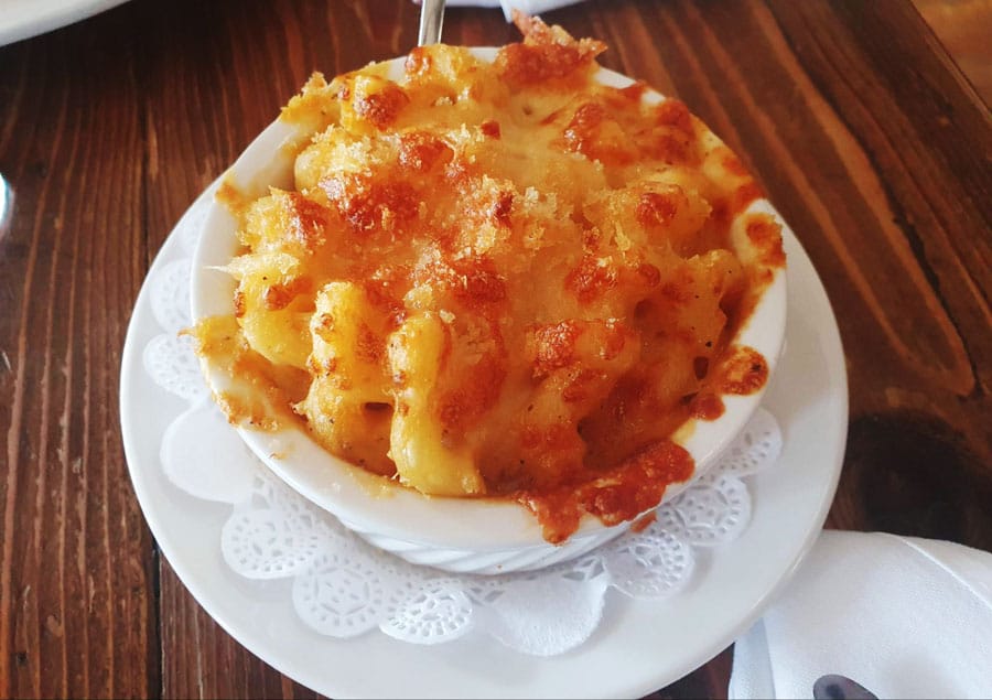 A macaroni and cheese on a small plate