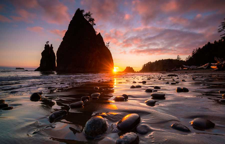 Colorful sky over Rialto Beach during sunset