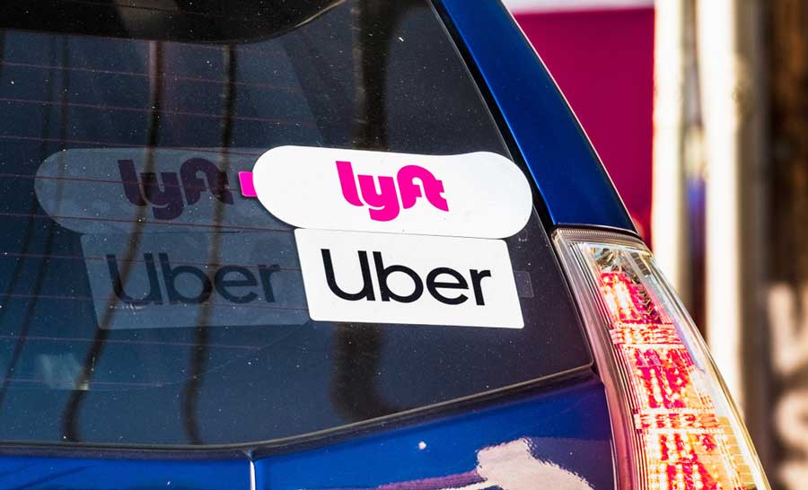 View of an uber sticker on the back of a car