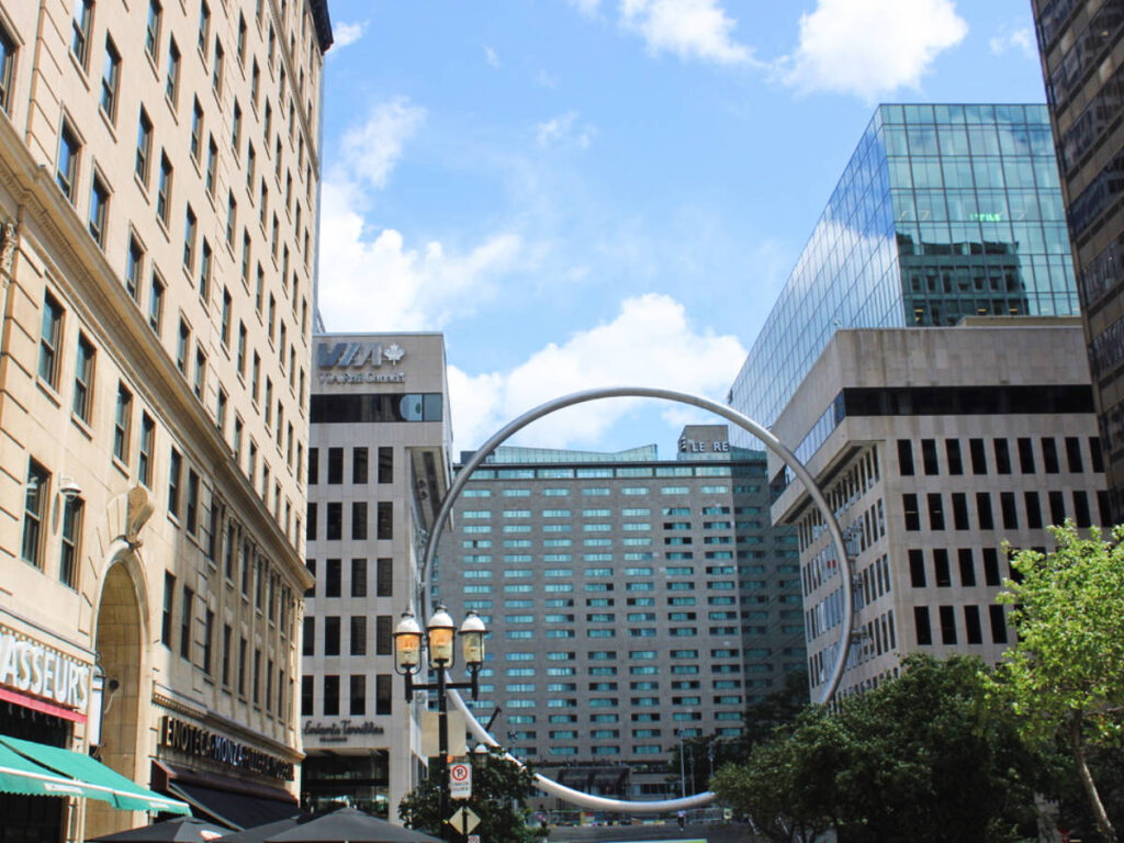 Blue sky over the Ring Statue in Downtown Montreal