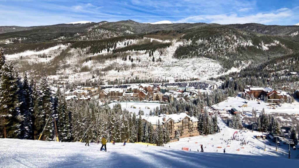 Aerial view of River Run Village from above the mountain slope during winter