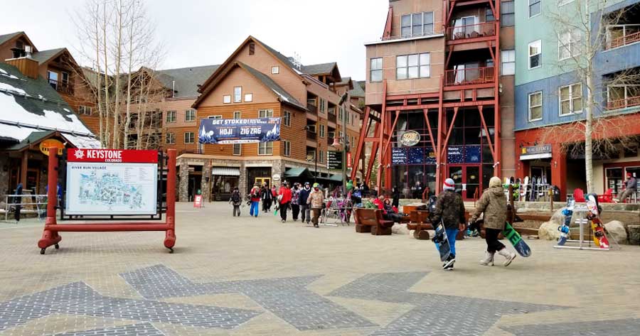 View of people roaming around in River Run Village