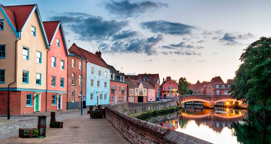 Colorful houses on the side of River Yare