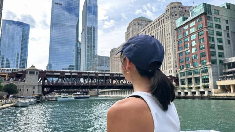 The author, Lea Rose Allbaugh looking out at the river in Chicago