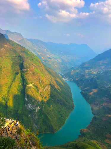 A river through the mountains in Ha Giang