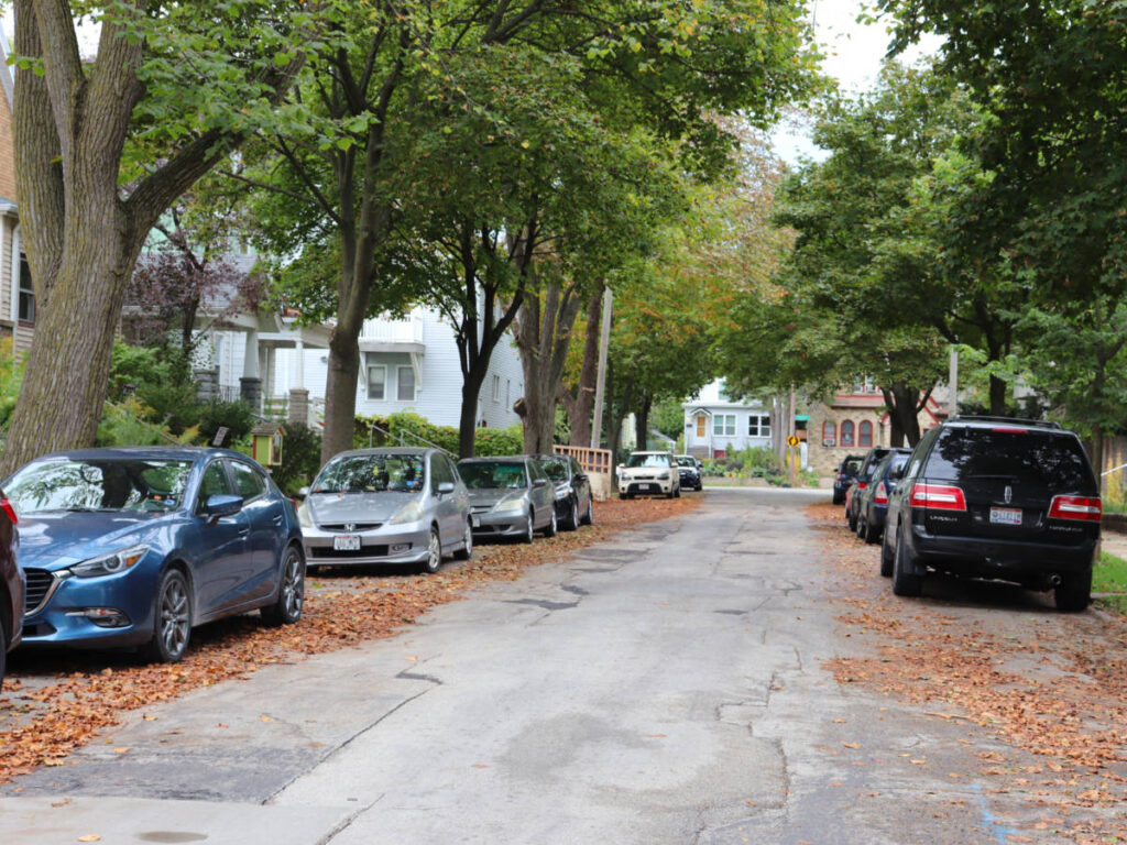 Cars parked along the street in the Riverwest neighborhood