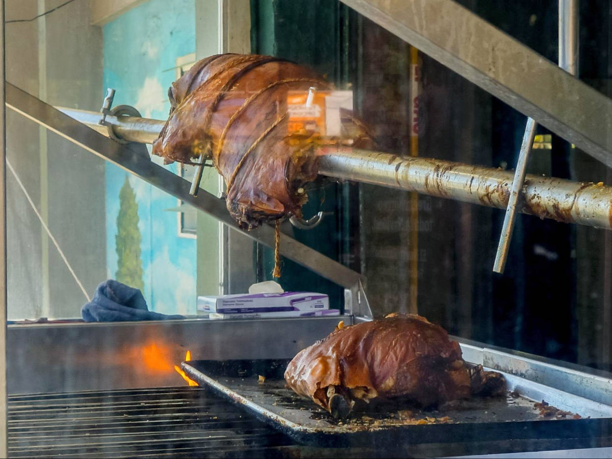 Roasted pork on display in Guavate