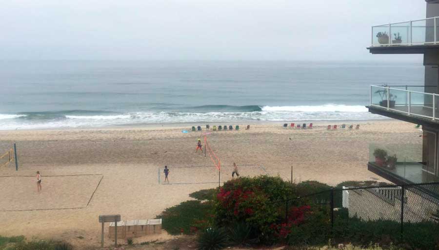 View of people playing beach volleyball in Robert Frazee State Beach