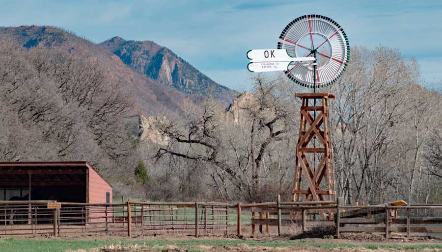 A vintage windmill in Rock Ledge Ranch