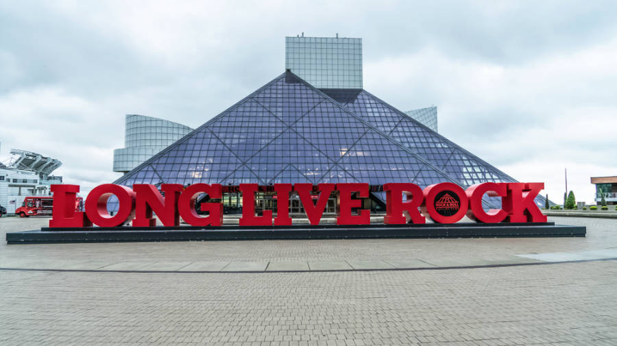 The glass triangle exterior of Rock and Roll Hall of Fame building