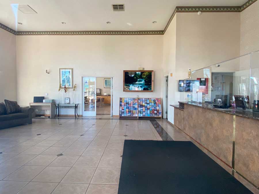 View from the inside of Rodeway Inn Oceanside Marina Bedroom