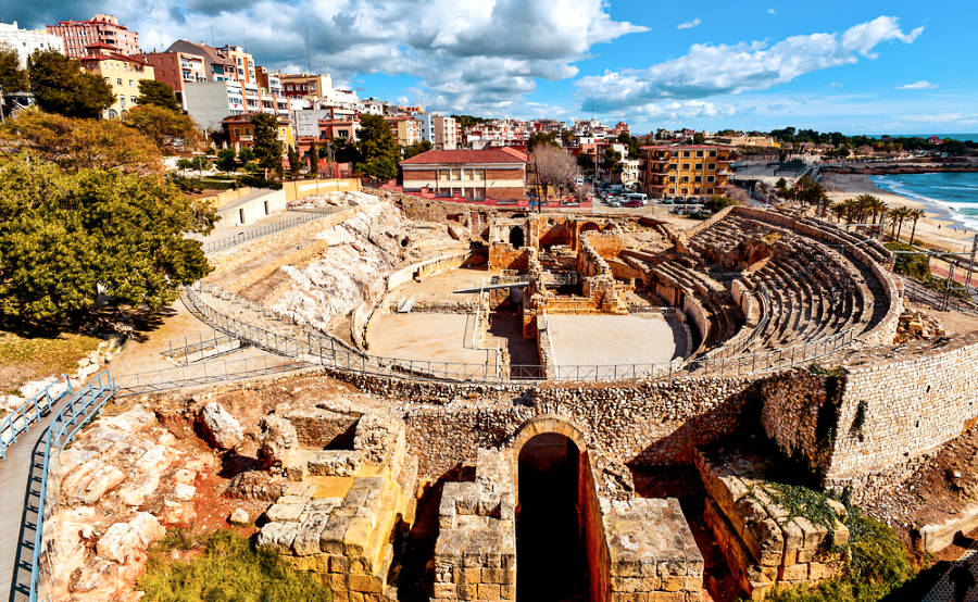Panoramic view of the ancient roman amphitheater ruins near the Mediterranean Sea in Tarragona