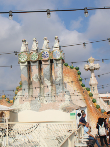 View of the colorful exterior from the rooftop of Casa Batlló