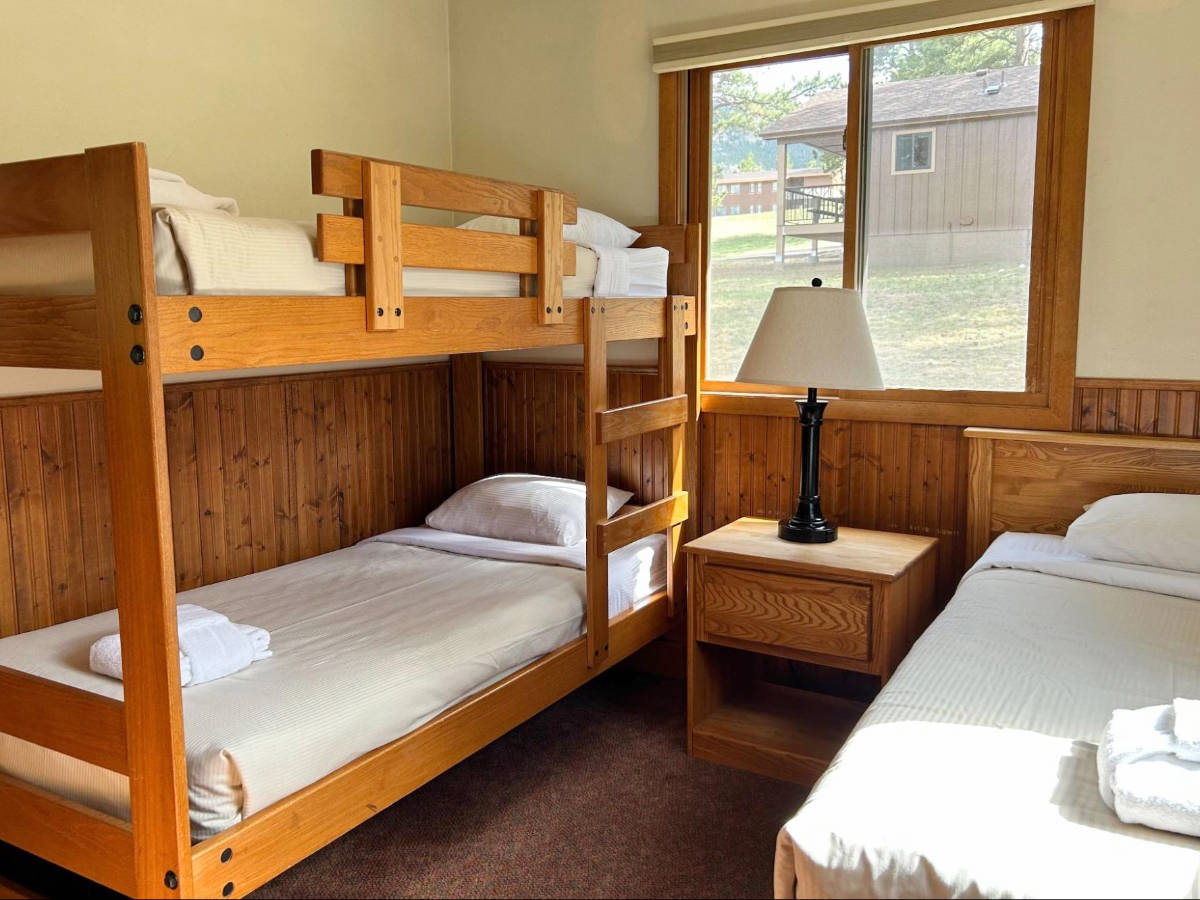 A double deck and a bed at the YMCA of the Rockies