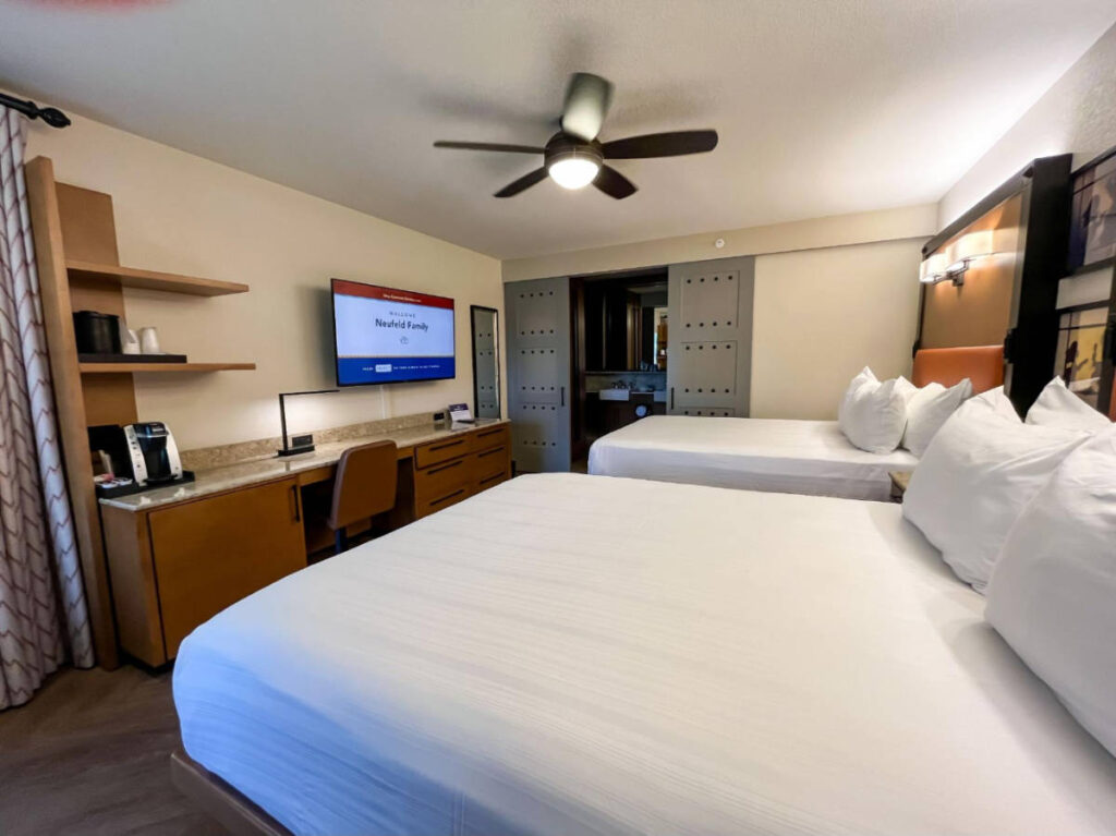 View of beds at the guest room in Disney’s Coronado Springs Resort