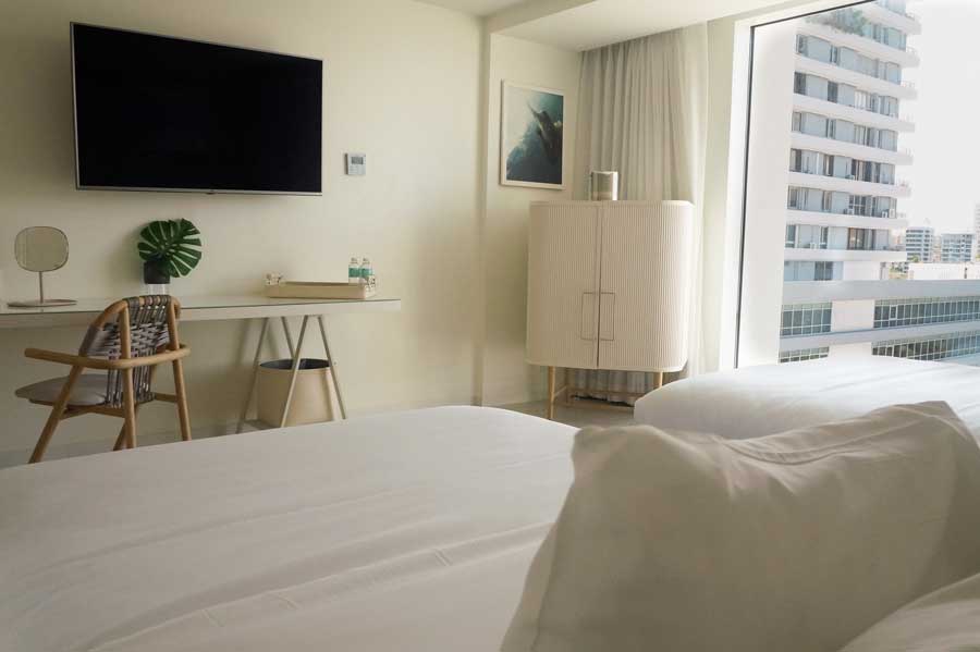 A television inside a bedroom in Condado Ocean Club