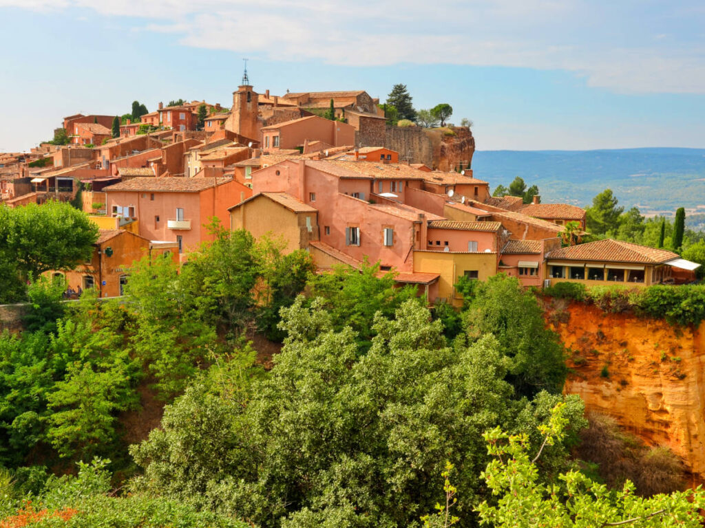 View of the Roussillon town surrounded by lush greenery
