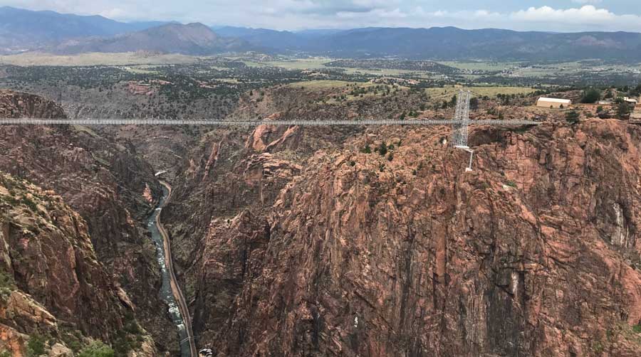 Aerial view of the Royal Gorge Bridge between the mountains