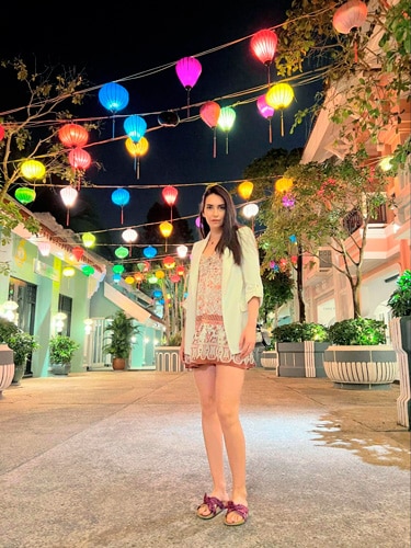 Clara at the Rue de Lamarck with Vietnamese lanterns at night