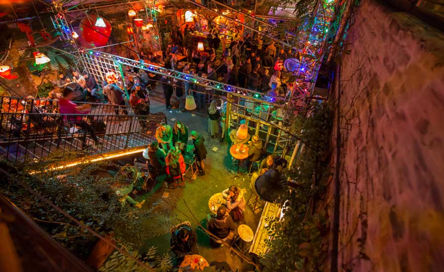 View of people enjoying their night in a ruin bar