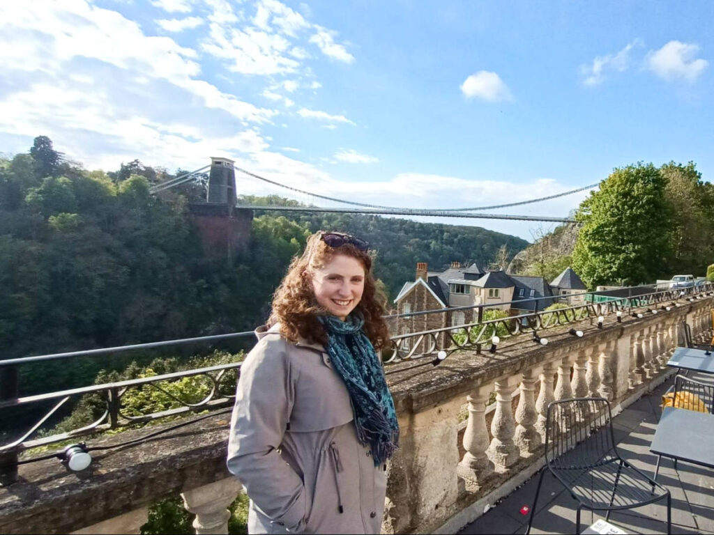 The author Ruthie Walters posing for a photo on the terrace at The Avon Gorge by Hotel du Vin