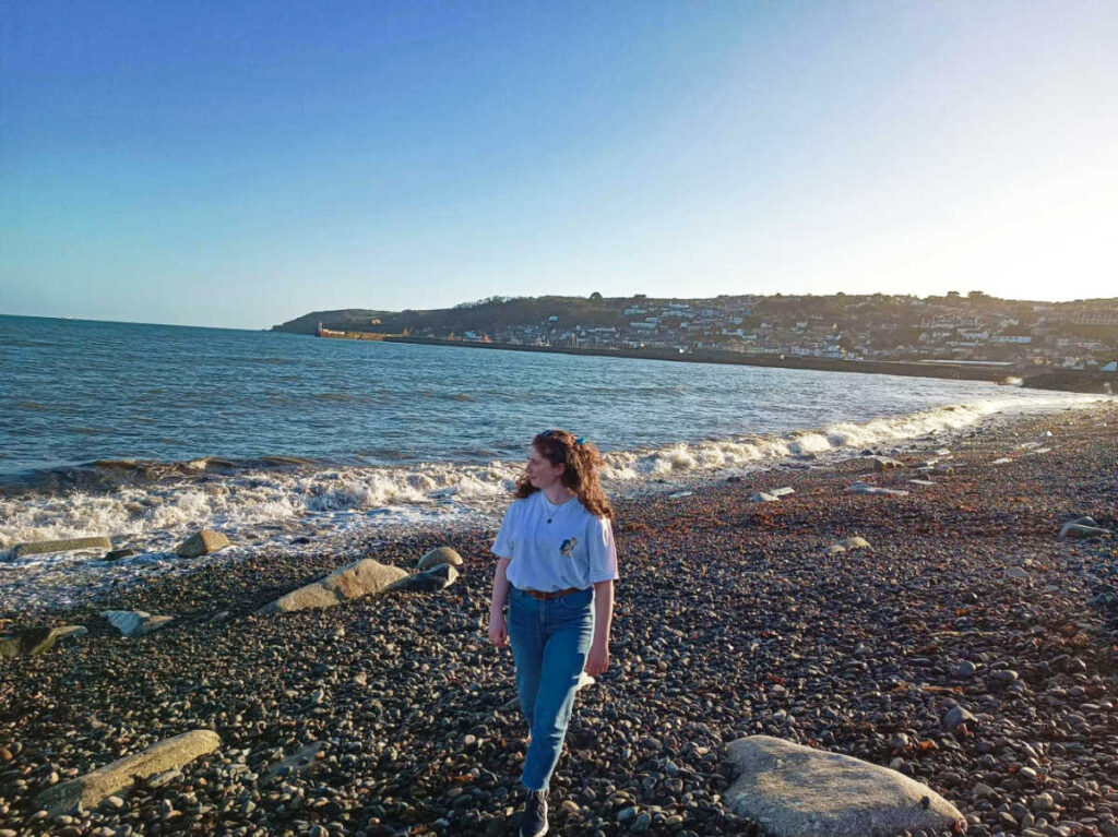 The author Ruthie Walters, admiring the ocean views and rocky shoreline