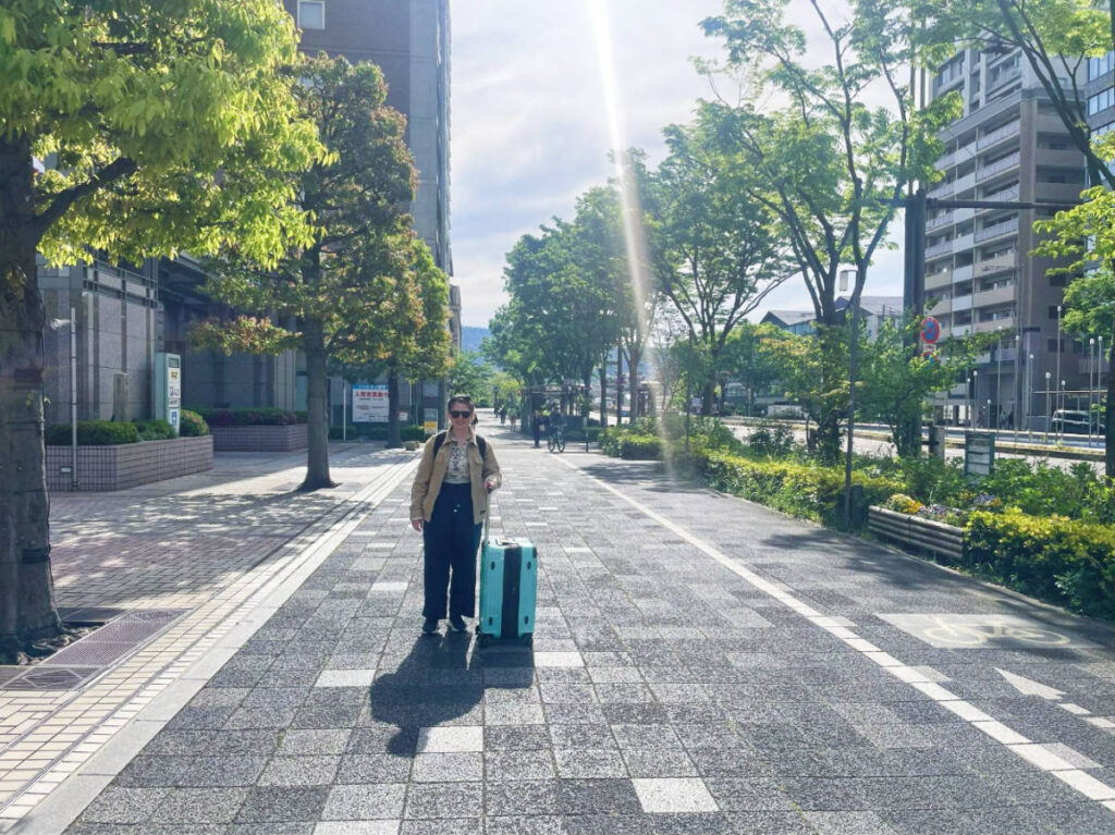 The author Ruthie Walters with her suitcase in Kyoto