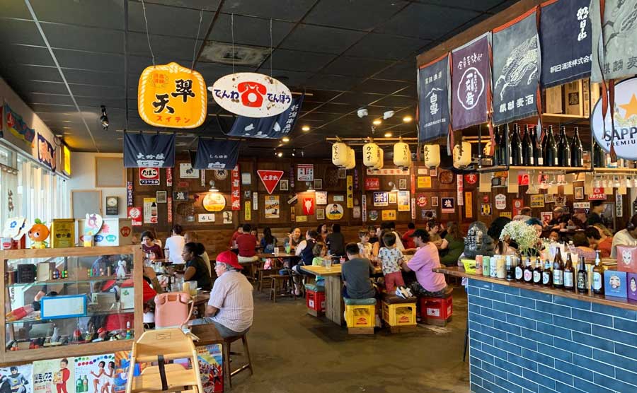 People enjoying their food in SUSURU
