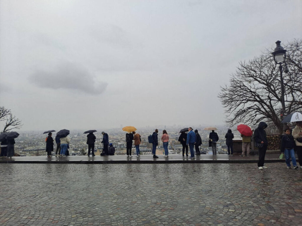 People admiring the overlooking view near Sacred Heart Basilica