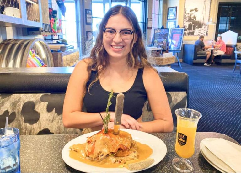 The author, Isabelle Pavese with a massive Andy’s Sage Fried Chicken Benedict in Hash House A Go Go