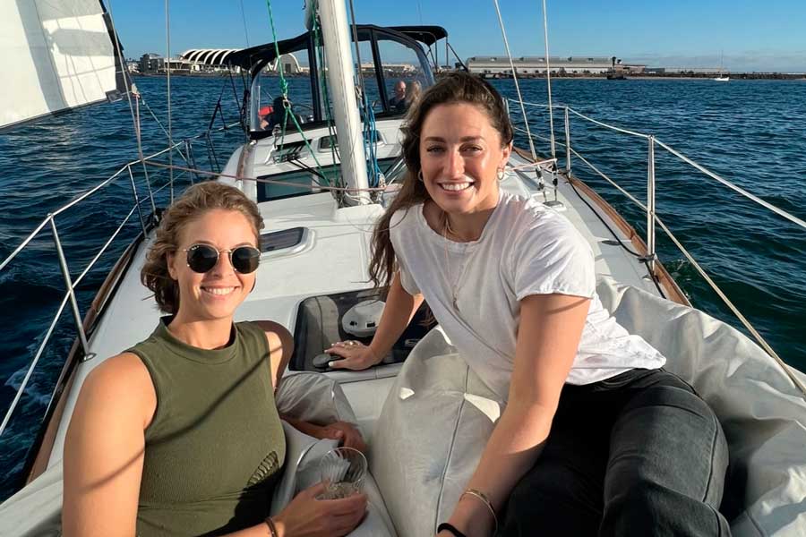 The author with her friend on a sunset sail tour in San Diego