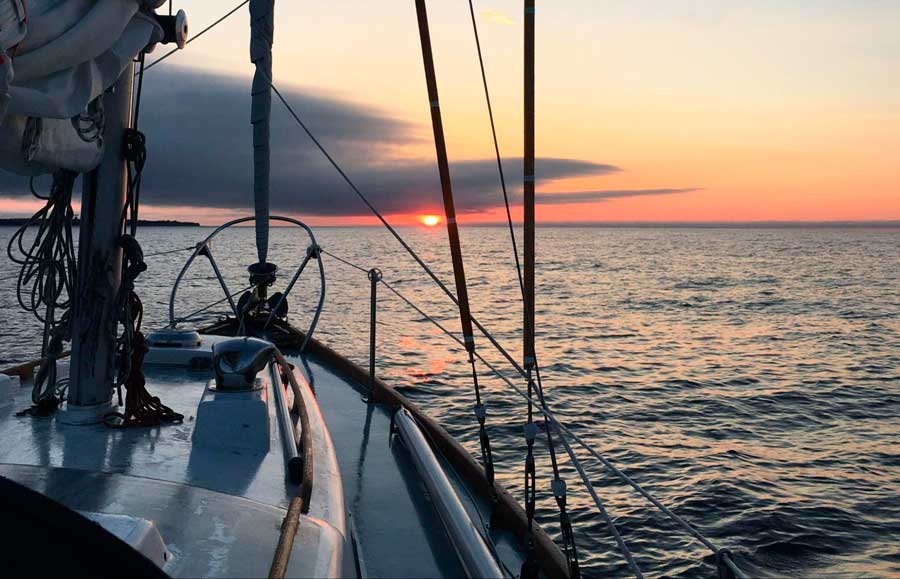 Sailing toward Montauk with the view of the colorful sky during sunset