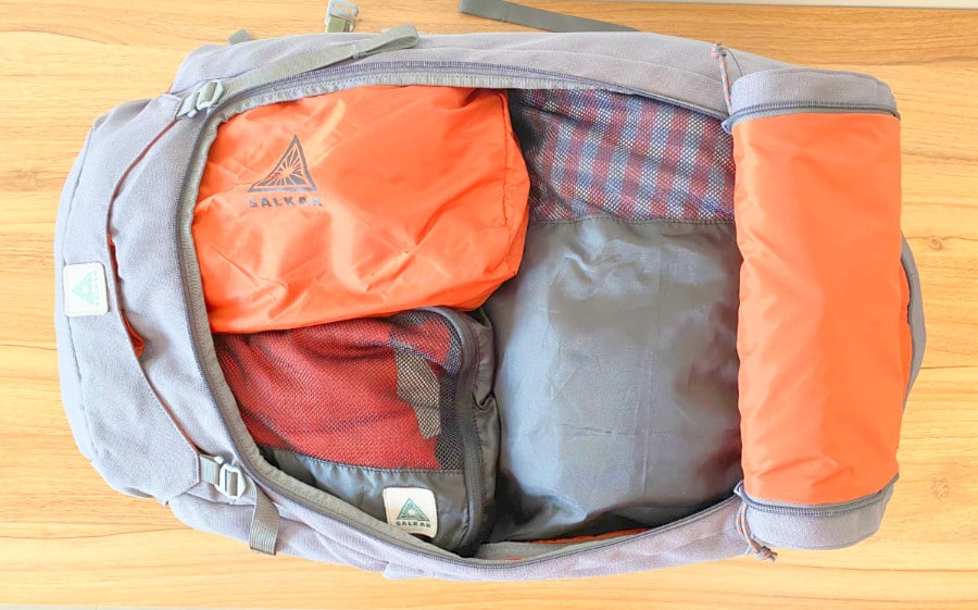 Top view of the Salkan Mainpack travel backpack with clothes and packing cubes inside