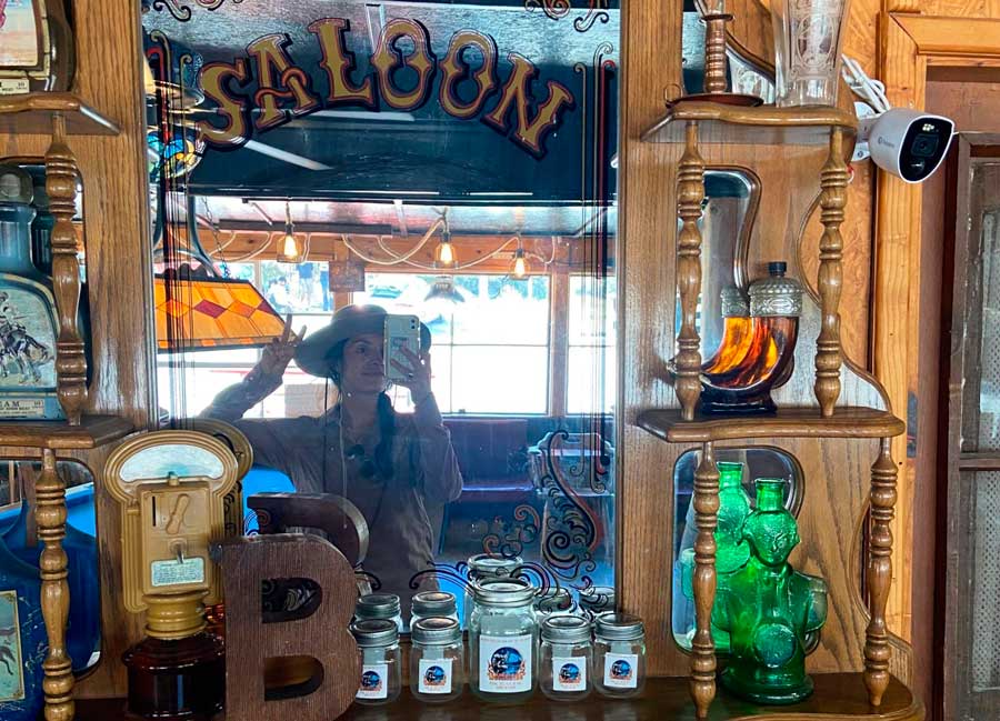 The author taking a mirror selfie inside a saloon in Julian
