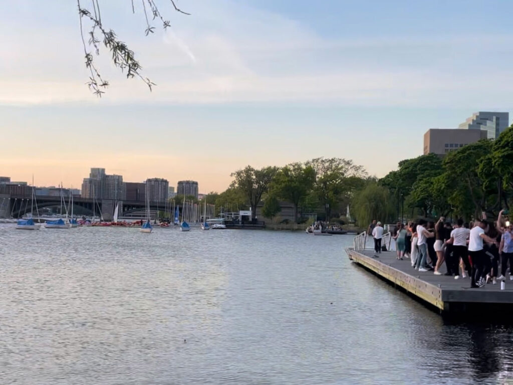 People dancing salsa at the Charles River Esplanade