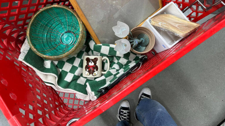 Thrifted goodies on a basket in Salvation Army