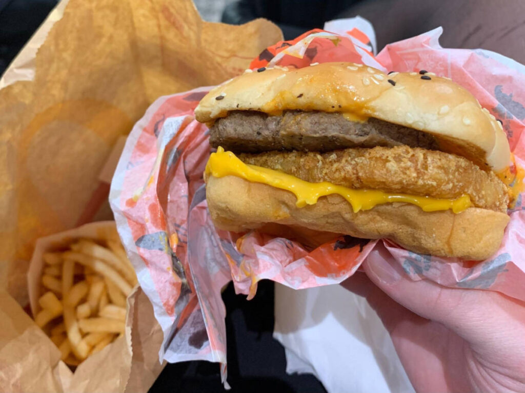 A hand holding a samurai mac