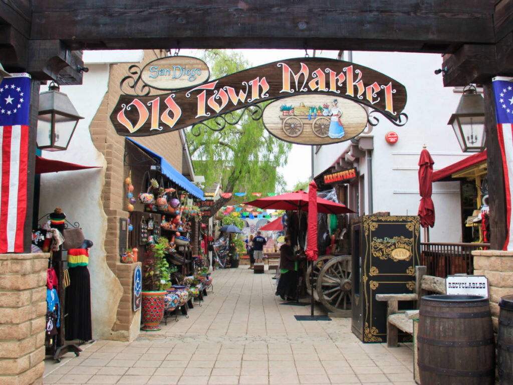 View of the arch sign and stalls at the Old Town Market in San Diego