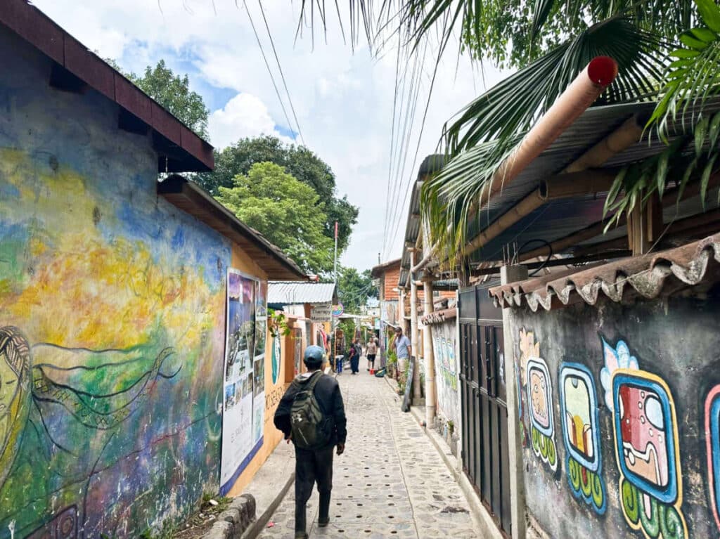 View of the people walking along the narrow streets in San Marcos La Laguna